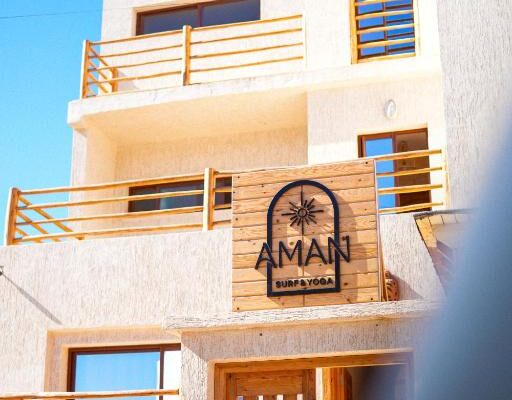 Aman surf paddle yoga