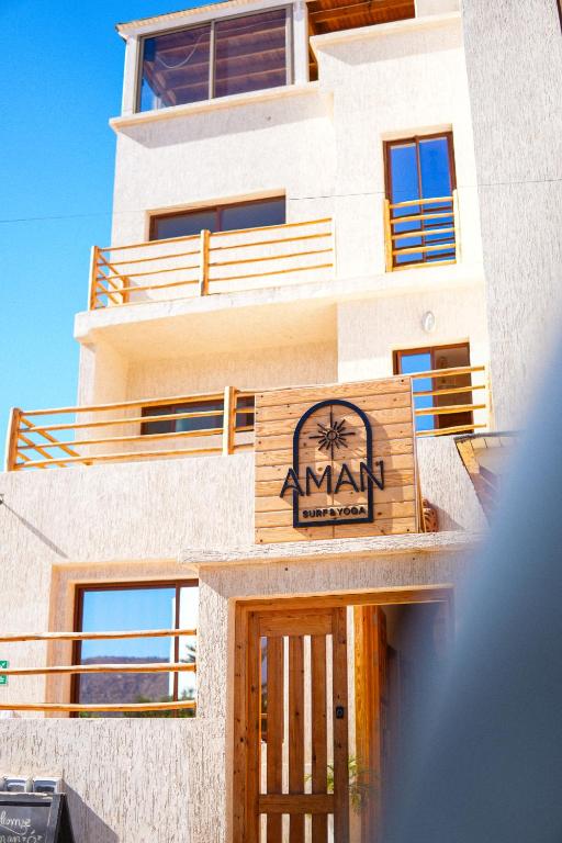 Aman surf paddle yoga